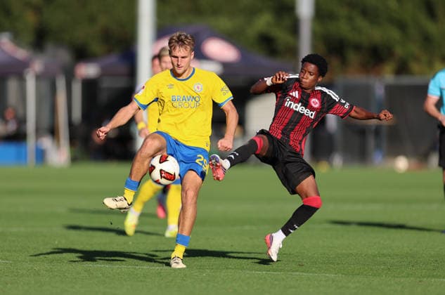 October 2, 2026, Soccer friendly match, Eintracht Frankfurt vs. Eintracht Braunschweig, from left: Lukas Frenkert (Eintracht Braunschweig), Lawrence Setordije (Eintracht Frankfurt). DFL and DFB regulations prohibit any use of photographs as image sequences and or quasi-video. xdcx Copyright: HMBxMedia Claus