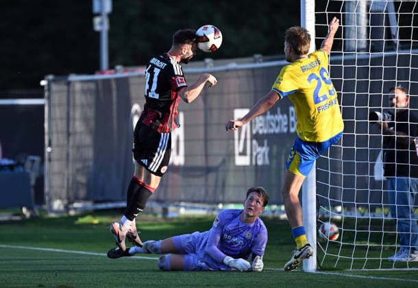October 2, 2026, xjhx, soccer friendly match, Eintracht Frankfurt vs. Eintracht Braunschweig; left: Paul Wünsch (Eintracht Frankfurt), Ron Thorben Hoffmann (Eintracht Braunschweig), Lukas Frenkert (Eintracht Braunschweig) scores the goal, making it 4–0 in Frankfurt am Main