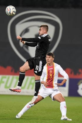 Roberts Savalnieks (11) of Latvia and Risto Radunovic (3) of Montenegro In action during UEFA Nations League Group C2 football game between Latvia and Montenegro in Riga, Latvia, Fri, Oct. 2, 2026. Riga Latvia Copyright: xRomanxKoksarovx RKV09766.JPG