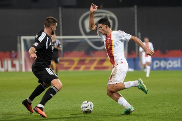 Nikola Krstovic (9) of Montenegro and Antonijs Cernomordijs (5) of Latvia In action during UEFA Nations League Group C2 football game between Latvia and Montenegro in Riga, Latvia, Fri, Oct. 2, 2026. Riga Latvia Copyright: xRomanxKoksarovx RKV09856.JPG