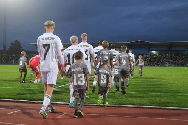 October 2, 2026 Men s Soccer 2026–2027 dachbleche24 State Cup, 2nd Round: SG Reppichau vs. Hallescher FC at Paul Greifzu Stadium, Dessau-Roßlau. SG Reppichau takes the field for the match in Dessau-Roßlau, Saxony-Anhalt, Germany