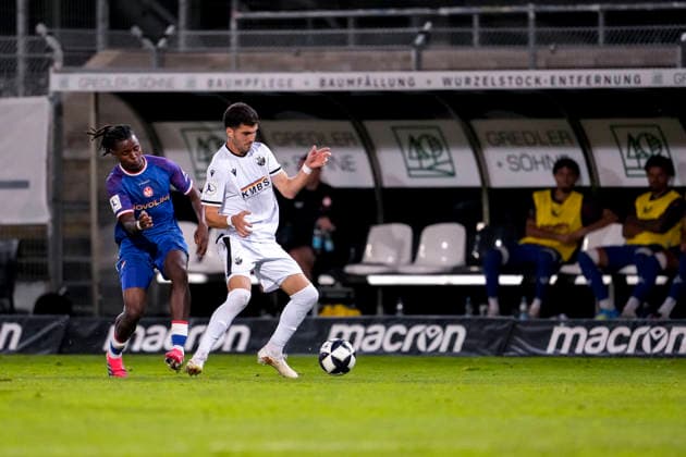 v li Chernoh Bah (FCK), 34, Mert Tasdelen (SVS), 11, tackle, game scene, duel, tackle, tackling, dynamics, action, 02 10 2026, Sandhausen, Germany, soccer, Regionalliga Southwest, SV Sandhausen 1 vs. FC Kaiserslautern II xozx