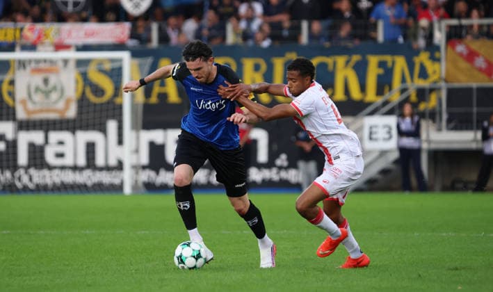 October 2, 2026, Soccer, Men s, Friendly Match, 2026–2027 Season, 1 FC Saarbrücken vs. AS Nancy Lorraine, Kaan Caliskaner (1 FC Saarbrücken) and Chafik El Hansar (AS Nancy Lorraine), Saarbrücken, Ludwigsparkstadion, Saarland, Germany Copyright: xFabianxKleerx