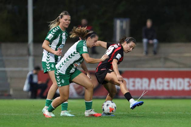 Luna Vanzeir of SV Werder Bremen and Loreen Bender of Bayer 04 Leverkusen battle for the ball during the Women s Bundesliga match between Bayer 04 Leverkusen and SV Werder Bremen at Ulrich Haberland Stadium on October 2, 2026, in Leverkusen, Germany. Photo by Oliver Kaelke, DeFodi Images. Luna Vanzeir of SV Werder Bremen and Loreen Bender of Bayer 04 Leverkusen battle for the ball during the Bundesliga match between Bayer 04 Leverkusen and SV Werder Bremen at Ulrich Haberland Stadium on October 2, 2026 in Leverkusen, Germany. Photo by Oliver Kaelke, DeFodi Images. DFB and DFL regulations prohibit any use of photographs as image sequences and or quasi-video. Photo by Oliver Kaelke, DeFodi Images.