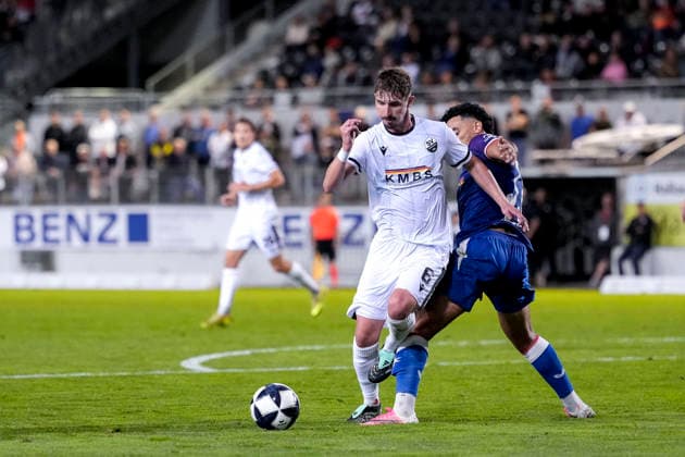 v li Niklas Tarnat SVS, 6, Nassim El Ouarti FCK, 33, tackle, game scene, duel, tackle, tackling, dynamics, action, foul, foul play, penalty kick resulting from a foul, October 2, 2026, Sandhausen, Germany, soccer, Regionalliga Southwest, SV Sandhausen 1 vs. FC Kaiserslautern II xozx