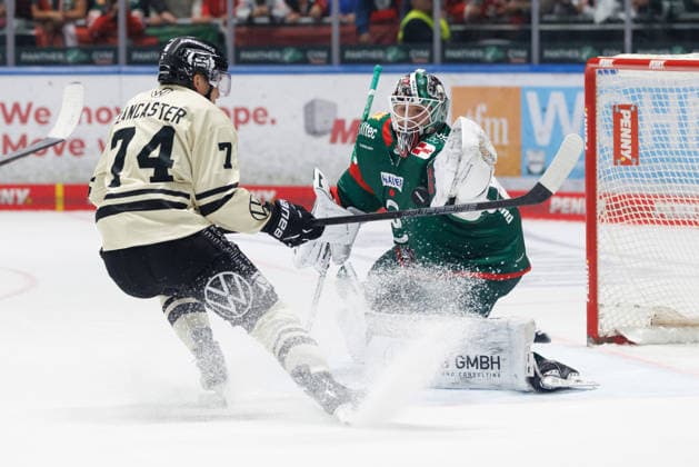 Tobias Ancicka, 45, of the Augsburger Panther, and Lester Lancaster, 74, of the Grizzlys Wolfsburg, during the game between the Augsburger Panther and the Grizzlys Wolfsburg, ice hockey, men s, DEL, 2026–2027, Matchday 5 on October 2, 2026, in Augsburg, Curt Frenzel Stadium, Bavaria, Germany