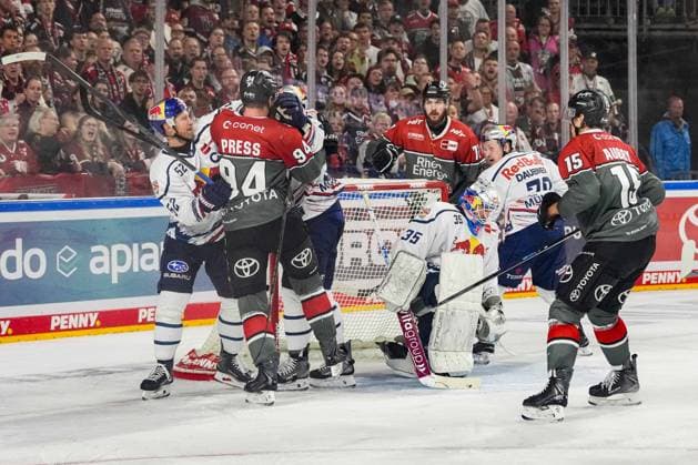 Ice Hockey: Penny DEL, Matchday 5—Cologne Sharks vs. EHC Red Bull Munich on October 2, 2026, at the Lanxess Arena in Cologne. Lots of scrums in front of Mathias Niederberger (Munich), center According to the regulations of the DEL (German Ice Hockey League), the publication and reuse of footage in electronic media and on devices of any kind during the game is not permitted xDMx
