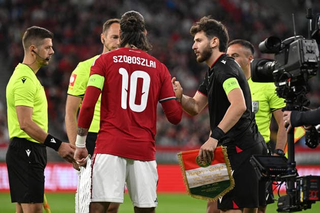 IPA89230183 - Captains exchanging greetings at midfield during the Nations League, Matchday 3, League B Group B2, between Hungary and Georgia, on October 2, 2026, at the Puskás Arena in Budapest, Hungary  Copyright: xVincenzoxOrlando IPAxSportx xx IPA89230183