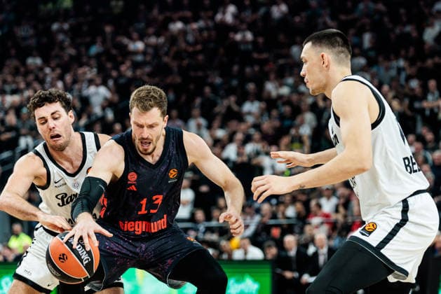 MUNICH, GERMANY - OCTOBER 02: Andreas Andi Obst (FC Bayern Muenchen, 13) controls the ball against Alessandro Pajola (Partizan Mozzart Bet Belgrade, 66) and Nikola Tanaskovic (Partizan Mozzart Bet Belgrade, 10) during the Turkish Airlines EuroLeague match between FC Bayern Muenchen vs. Partizan Mozzart Bet Belgrade at SAP Garden on round 3 of Turkish Airlines EuroLeague on October 02, 2026 in Munich, Germany. Bavaria Germany Copyright: xSteffiexWunderlx