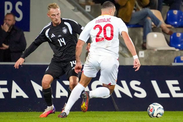 October 2, 2026, Riga, Latvia: Latvian player ANDREJS CIGANIKIS (L) vies with MILUTIN OSMAJIC of Montenegro during the League C match of UEFA Nations League between Latvia and Montenegro in Riga, Latvia, Oct. 2, 2026. League C Match Of UEFA Nations League Between Latvia And Montenegro  - ZUMAp305 20261002_zip_p305_007 Copyright: xEdijsxPalensx
