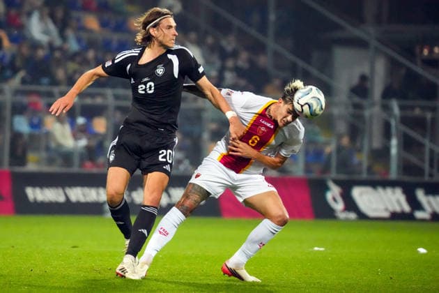 October 2, 2026, Riga, Latvia: Latvian player ROBERTS ULDRIKIS (L) vies with SLOBODAN RUBEZHICH of Montenegro during the League C match of UEFA Nations League between Latvia and Montenegro in Riga, Latvia, Oct. 2, 2026. League C Match Of UEFA Nations League Between Latvia And Montenegro  - ZUMAp305 20261002_zip_p305_015 Copyright: xEdijsxPalensx
