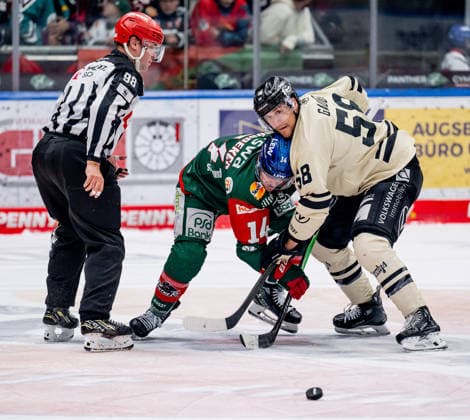 Linesman Maksim Cepik officiates a faceoff between Donald D. J. Busdeker of the Augsburger Panther, 14, and Tyler Gaudet of the Grizzlys Wolfsburg, 58 GER, Augsburger Panther vs. Grizzlys Wolfsburg, ice hockey, DEL, 2026–2027 season, Matchday 4, October 2, 2026. Photo: HMB Media, Heike Feiner Copyright: HMBxMedia HeikexFeiner