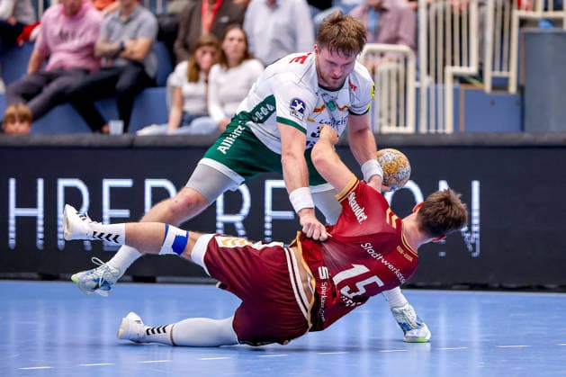 October 2, 2026, Matchday 6 of the 2nd Handball Bundesliga, TuSEM Essen vs. SC DHfK Leipzig; Nils Homscheid (TuSEM Essen) 15 in a one-on-one battle against Franz Semper (SC DHfK Leipzig) 32; North Rhine-Westphalia, Germany