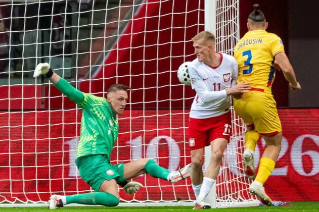 WARSAW, POLAND - OCTOBER 2: Marcin Bulka Karol Swiderski Radu Dragusin during the UEFA Nations League Group B4 Round 3 MD1 match between Poland nad Romania at PGE Narodowy on October 2, 2026 in Warsaw, Poland --- Pilka nozna. Liga Narodow. Polska - Rumunia. (Photo by Kai Taller Arena Akcji) NEWSPIX.PL --- newspix.pl POLAND OUT! 