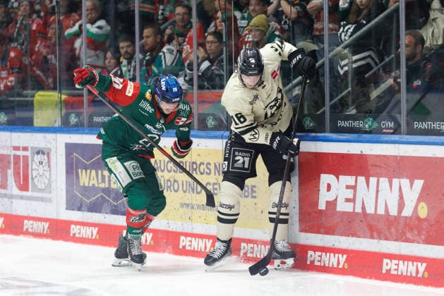 Tommy Pasanen, 16, of the Grizzlys Wolfsburg, and Philipp Krauss, 20, of the Augsburger Panther, during the game between the Augsburger Panther and the Grizzlys Wolfsburg, ice hockey, men s, DEL, 2026–2027, Matchday 5 on October 2, 2026, in Augsburg, Curt Frenzel Stadium, Bavaria, Germany