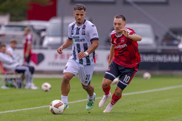 Nuremberg, Germany, October 2, 2026; 2026-2027 preseason match: 1. FC Nürnberg vs. FC Ingolstadt 04. Pictured, from left, in a tackle: Sejdo Dukakov (FCI) and Julian Justvan (FCN) at Sportpark Valznerweiher, Bavaria. Copyright: xFotostandx xSchäferx