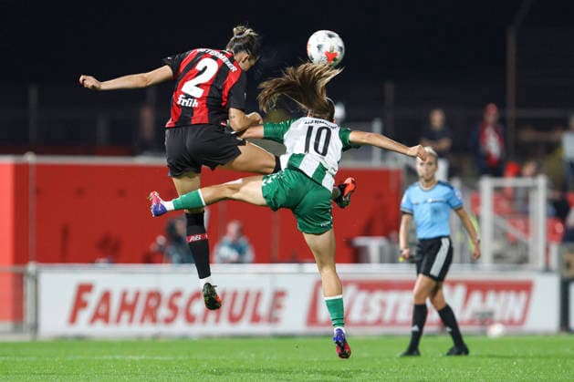 Selina Ostermeier of Bayer 04 Leverkusen and Tuana Mahmoud of SV Werder Bremen battle for the ball during the Women s Bundesliga match between Bayer 04 Leverkusen and SV Werder Bremen at Ulrich Haberland Stadium on October 2, 2026, in Leverkusen, Germany. Photo by Oliver Kaelke, DeFodi Images. Selina Ostermeier of Bayer 04 Leverkusen and Tuana Mahmoud of SV Werder Bremen battle for the ball during the Bundesliga match between Bayer 04 Leverkusen and SV Werder Bremen at Ulrich Haberland Stadium on October 2, 2026 in Leverkusen, Germany. Photo by Oliver Kaelke, DeFodi Images. DFB and DFL regulations prohibit any use of photographs as image sequences and or quasi-video. Photo by Oliver Kaelke, DeFodi Images.
