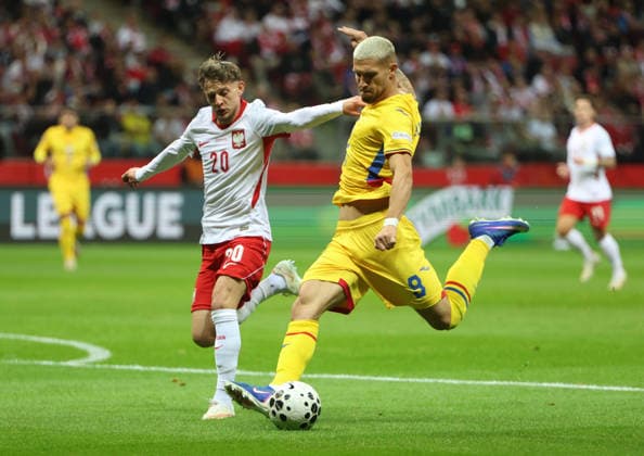 October 2, 2026, Warsaw, Mazowieckie, Poland: SEBASTIAN SZYMANSKI of Poland and DANIEL BIRLIGEA of Romania during the match in the League B UEFA Nations League. Warsaw, Poland. UEFA Nations League - Poland 6:0 Romania  - ZUMAc278 20261002_zsp_c278_001 Copyright: xMarcinxCholewinskix