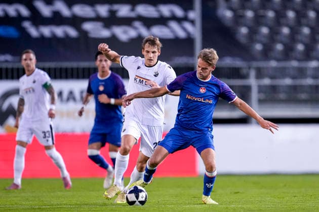 From left: Max Christiansen (SVS), 26, Nicklas Shipnoski (FCK), 7, tackle, game scene, duel, tackle, tackling, dynamism, action, 02 10 2026, Sandhausen, Germany, soccer, Regionalliga Southwest, SV Sandhausen 1 vs. FC Kaiserslautern II xozx