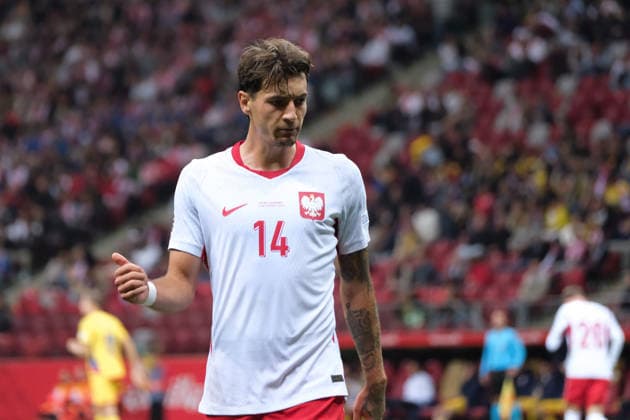 October 2, 2026, Warsaw, Masovian Voivodeship, Poland: Poland s JAKUB KIWIOR (14) in action during a UEFA Nations League Group B4 match between the Polish and Romanian national teams at the PGE Narodowy Stadium in Warsaw. Poland went on to win against Romania 6 goals to 0. Soccer 2026: UEFA Nations League: Poland 6:0 Romania - ZUMAk204 20261002_zip_k204_011 Copyright: xRomanxKozielx