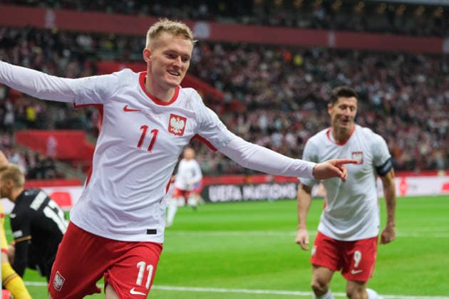 October 2, 2026, Warsaw, Masovian Voivodeship, Poland: Poland s KAROL SWIDERSKI (11) celebrates after a Romania own-goal during a UEFA Nations League Group B4 match between the Polish and Romanian national teams at the PGE Narodowy Stadium in Warsaw. Poland went on to win against Romania 6 goals to 0. Soccer 2026: UEFA Nations League: Poland 6:0 Romania - ZUMAk204 20261002_zip_k204_023 Copyright: xRomanxKozielx