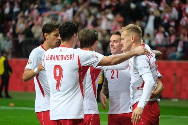 October 2, 2026, Warsaw, Masovian Voivodeship, Poland: Poland s NICOLA ZALEWSKI (21), KAROL SWIDERSKI (11), PRZEMYSLAW FRANKOWSKI (19), ROBERT LEWANDOWSKI (9), and JAKUB KIWIOR (14) celebrate after a Romania own-goal during a UEFA Nations League Group B4 match between the Polish and Romanian national teams at the PGE Narodowy Stadium in Warsaw. Poland went on to win against Romania 6 goals to 0. Soccer 2026: UEFA Nations League: Poland 6:0 Romania - ZUMAk204 20261002_zip_k204_026 Copyright: xRomanxKozielx