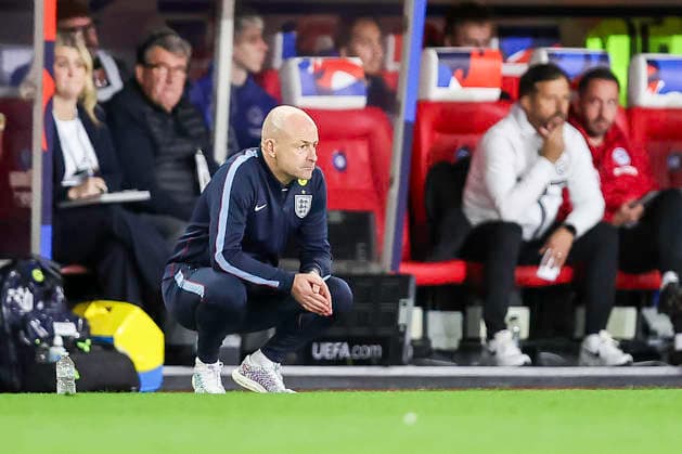 England v Slovakia - UEFA U21, U 21 EURO 2027 Qualifier Lee Carsley, manager of England U21s, watches the early action from a crouched position during the UEFA Under 21 Championship Qualifiers Group D match between England Under 21s and Slovakia at the bet365 Stadium in Stoke-on-Trent, on October 2, 2026. Stoke-on-Trent Staffordshire United Kingdom Copyright: xMIxNewsx originalFilename:fletcher-englandu261002_npZ2m