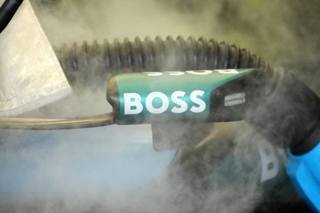 October 3, 2026, Sepang International Circuit, Kuala Lumpur, 2026 Formula 1 Gulf Air Bahrain Grand Prix, The cockpit of Fernando Alonso (ESP) of the Aston Martin Aramco Formula One Team is being cooled before practice; steam drifts across the rearview mirror featuring the BOSS sponsor logo. Photo by Hasan Bratic, DeFodi Images