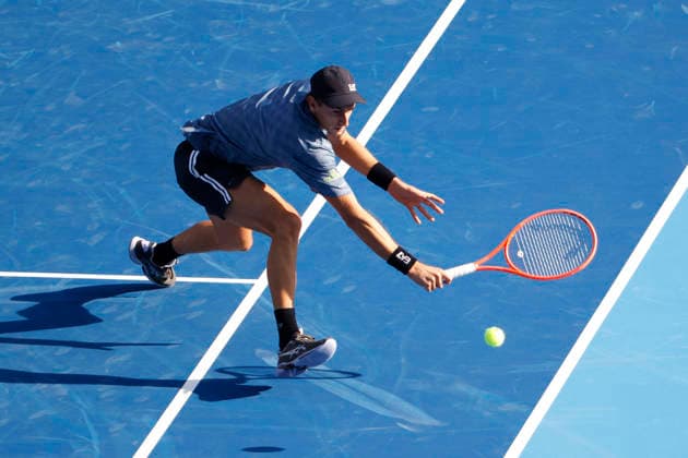 October 3, 2026, Tokyo, Japan: Matteo Arnaldi (Italy) returns a shot against Carlos Alcaraz (Spain) during their Round of 16 match at the Kinoshita Group Japan Open Tennis Championships at Ariake Colosseum in Tokyo. The tournament runs from September 29 to October 6. Alcaraz won 7-6(6), 6-1. Tennis 2026: Denis Shapovalov Battles Alejandro Tabilo In Japan Open  - ZUMAm191 20261003_aap_m191_050 Copyright: xRodrigoxReyesxMarinx