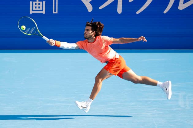 October 3, 2026, Tokyo, Japan: Carlos Alcaraz (Spain) returns a shot against Matteo Arnaldi (Italy) during their Round of 16 match at the Kinoshita Group Japan Open Tennis Championships at Ariake Colosseum in Tokyo. The tournament runs from September 29 to October 6. Alcaraz won 7-6(6), 6-1. Tokyo Japan - ZUMAm191 20261003_aap_m191_056 Copyright: xRodrigoxReyesxMarinx