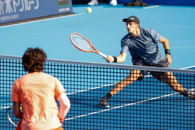 October 3, 2026, Tokyo, Japan: (From top to bottom) Matteo Arnaldi (Italy) returns a shot against Carlos Alcaraz (Spain) during their Round of 16 match at the Kinoshita Group Japan Open Tennis Championships at Ariake Colosseum in Tokyo. The tournament runs from September 29 to October 6. Alcaraz won 7-6(6), 6-1. Tennis 2026:Carlos Alcaraz Battles Matteo Arnaldi In Japan Open - ZUMAm191 20261003_aap_m191_075 Copyright: xRodrigoxReyesxMarinx