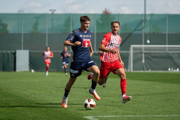 October 3, 2026, xjyhynx, soccer exhibition match, SC Freiburg vs. FC Lucerne, from left: Lars Villiger 27, FC Lucerne dribbling past Max Rosenfelder 37, SC Freiburg, Freiburg