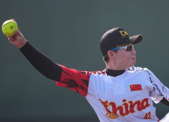 (261003) -- ANJO, Oct. 3, 2026 -- Chai Yinan of China throws the ball during the women s gold medal match of softball between China and Japan at the 20th Asian Games Aichi-Nagoya 2026 in Anjo of Aichi Prefecture, Japan, Oct. 3, 2026. ) (SP)JAPAN-ANJO-ASIAN GAMES-SOFTBALL-WOMEN S GOLD MEDAL MATCH LuoxYuan