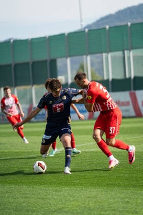 October 3, 2026, xjyhynx, soccer exhibition match, SC Freiburg vs. FC Lucerne, from left: Sascha Meyer (71), FC Lucerne in a tackle with Max Rosenfelder (37), SC Freiburg, Freiburg