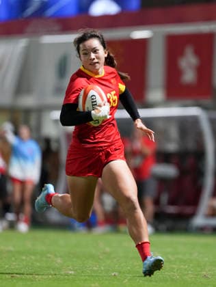 (261003) -- NAGOYA, Oct. 3, 2026 -- Zhang Le of team China competes during the women s gold medal match of rugby sevens between China and Japan at the 20th Asian Games Aichi-Nagoya 2026 in Nagoya, Japan, Oct. 3, 2026. ) (SP)JAPAN-NAGOYA-ASIAN GAMES-RUGBY SEVENS-WOMEN ZhangxHaobo 