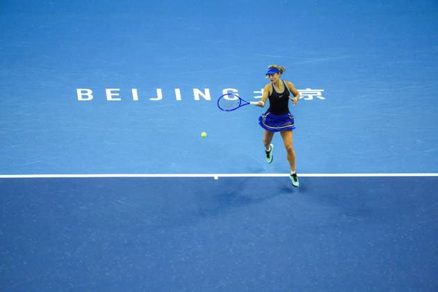 (261003) -- BEIJING, Oct. 3, 2026 -- Anna Kalinskaya of Russia hits a return to Zheng Qinwen of China during the women s singles second round match at 2026 China Open tennis tournament in Beijing, China, Oct. 3, 2026. ) (SP)CHINA-BEIJING-TENNIS-CHINA OPEN-WOMEN S SINGLES(CN) XiexHan 