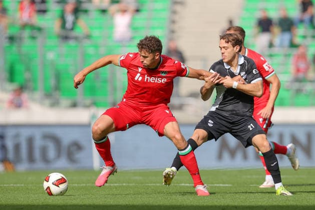 October 3, 2026, xtgx, soccer exhibition match, Hannover 96 vs. SC Verl, from left: Benedikt Pichler (Hannover), 11, Mika Clausen (Verl) – tackle, duel, battle, DFL DFB REGULATIONS PROHIBIT ANY USE OF PHOTOGRAPHS AS IMAGE SEQUENCES AND OR QUASI-VIDEO Hannover