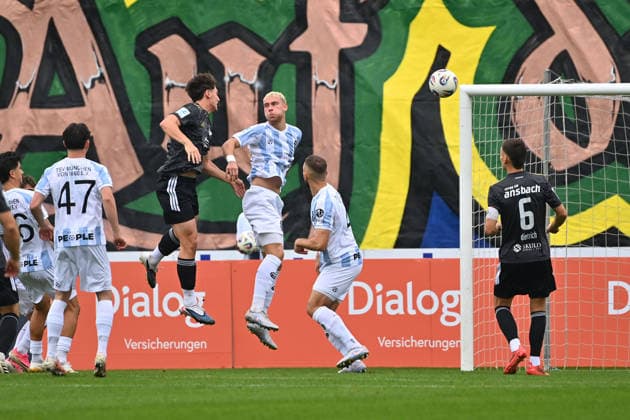 Header by Luca BEETZ, action, tackle against Lasse FASSMANN (1860 Munich) and Felix WEBER (1860 Munich), Bavarian Regional League soccer season 2026–2027,Matchday 26–27, December 12: TSV 1860 Munich vs. SpVgg Ansbach on October 3, 2026, at the Grünwalder Stadion in Munich