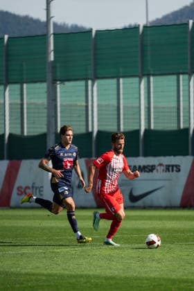 October 3, 2026, xjyhynx, soccer exhibition match, SC Freiburg vs. FC Lucerne, from left: Loïc Lüthi 21, FC Lucerne trails SC Freiburg; Lucas Höler 9, SC Freiburg