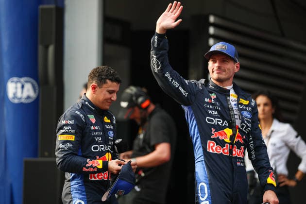 (261003) -- SEPANG, Oct. 3, 2026 -- Pole position qualifier Red Bull s Max Verstappen (R) of the Netherlands waves to spectators after the qualifying session of the Formula One Bahrain Grand Prix at the Sepang International Circuit near Kuala Lumpur, Malaysia, Oct. 3, 2026. (Photo by Qian Jun Xinhua) (SP)MALAYSIA-SEPANG-F1-BAHRAIN GRAND PRIX 2026-QUALIFYING YuanxRui