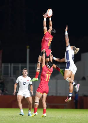 (261003) -- NAGOYA, Oct. 3, 2026 -- Huang Aoqi (top) of China competes during the men s gold medal match of rugby sevens between China and Hong Kong of China at the 20th Asian Games Aichi-Nagoya 2026 in Nagoya, Japan, Oct. 3, 2026. ) (SP)JAPAN-NAGOYA-ASIAN GAMES-RUGBY SEVENS-MEN-FINAL ZhangxHaobo 