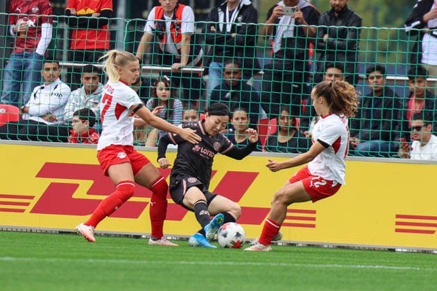 Germany Soccer Google Pixel Women s Bundesliga 2026 2027, Matchday 6: RB Leipzig vs. FSV Mainz 05, RB Leipzig Training Center in Leipzig—a tackle by Akari Kurishima (No. 1, FSV Mainz 05 Women) and Jasmien Mathys (No. 12, RB Leipzig Women) Copyright: xLucasxWalterx