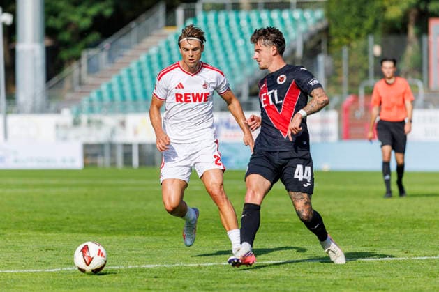 KOELN, GERMANY - OCTOBER 3, 2026: Joel Schmied (1. FC Köln, 2) and Niklas Castelle (FC Viktoria Köln, 44) during the friendly match between FC Viktoria Köln vs. 1. FC Köln at the Sportpark Hoehenberg on October 3, 2026 in Koeln, Germany. DFL REGULATIONS PROHIBIT ANY USE OF PHOTOGRAPHS AS IMAGE SEQUENCES AND OR QUASI-VIDEO. Nordrhein-Westfalen Germany Copyright: xLeahxKohringx