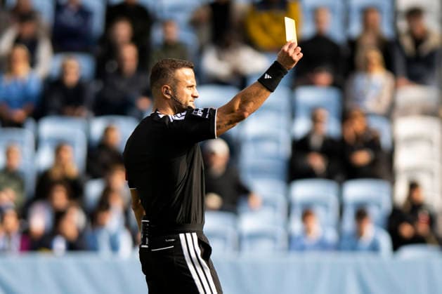 261003 Referee Rinon Hasani showing a yellow card during the friendly match between Malmö FF and FC Nordsjælland on October 3, 2026 in Malmö. Photo by Avdo Bilkanovic, BILDBYRAN COP 115 AB0391. soccer, football, fotball, friendly match, Malmö FF, FC Nordsjälland, bbeng  Copyright: AVDOxBILKANOVIC BB261003AB042