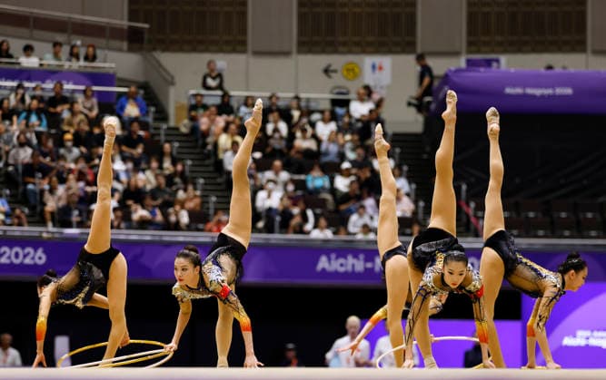 (261003) -- NAGOYA, Oct. 3, 2026 -- Players of team China compete during the 3 Hoops and 2 Clubs of the Group All-Around of Rhythmic gymnastics, Rhythmische Sportgymnastik, RSG at 20th Asian Games Aichi-Nagoya 2026 in Nagoya, Japan, Oct. 3, 2026. ) (SP)JAPAN-NAGOYA-ASIAN GAMES-RHYTHMIC GYMNASTICS-GROUP ALL-AROUND-FINAL WuxZhizun