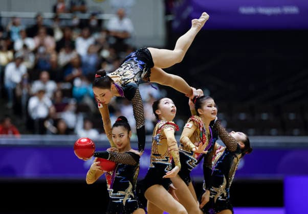 (261003) -- NAGOYA, Oct. 3, 2026 -- Players of team Japan compete during the Group All-Around of Rhythmic gymnastics, Rhythmische Sportgymnastik, RSG at 20th Asian Games Aichi-Nagoya 2026 in Nagoya, Japan, Oct. 3, 2026. ) (SP)JAPAN-NAGOYA-ASIAN GAMES-RHYTHMIC GYMNASTICS-GROUP ALL-AROUND-FINAL WuxZhizun 