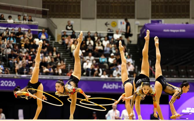 (261003) -- NAGOYA, Oct. 3, 2026 -- Players of team China compete during the 3 Hoops and 2 Clubs of the Group All-Around of Rhythmic gymnastics, Rhythmische Sportgymnastik, RSG at 20th Asian Games Aichi-Nagoya 2026 in Nagoya, Japan, Oct. 3, 2026. ) (SP)JAPAN-NAGOYA-ASIAN GAMES-RHYTHMIC GYMNASTICS-GROUP ALL-AROUND-FINAL WuxZhizun