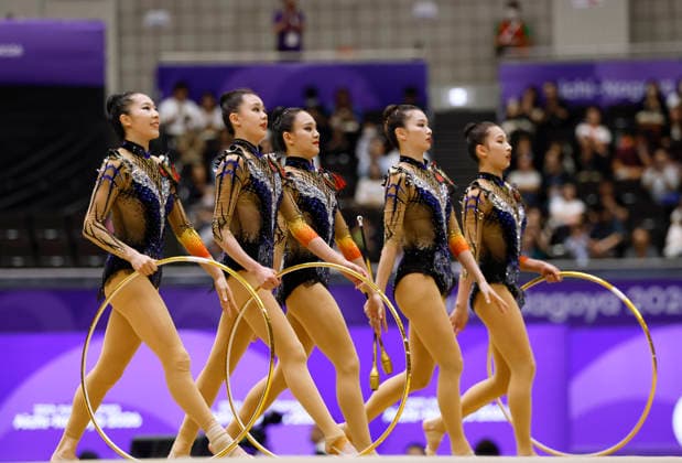 (261003) -- NAGOYA, Oct. 3, 2026 -- Players of team China compete during the 3 Hoops and 2 Clubs of the Group All-Around of Rhythmic gymnastics, Rhythmische Sportgymnastik, RSG at 20th Asian Games Aichi-Nagoya 2026 in Nagoya, Japan, Oct. 3, 2026. ) (SP)JAPAN-NAGOYA-ASIAN GAMES-RHYTHMIC GYMNASTICS-GROUP ALL-AROUND-FINAL WuxZhizun