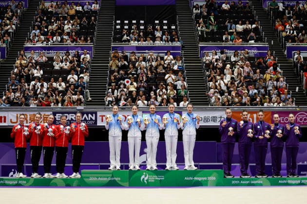 (261003) -- NAGOYA, Oct. 3, 2026 -- Gold medalist team China (C), silver medalist team Japan (L) and bronze medalist team Kazakhstan pose during the awarding ceremony for the Group All-Around of Rhythmic gymnastics, Rhythmische Sportgymnastik, RSG at 20th Asian Games Aichi-Nagoya 2026 in Nagoya, Japan, Oct. 3, 2026. ) (SP)JAPAN-NAGOYA-ASIAN GAMES-RHYTHMIC GYMNASTICS-GROUP ALL-AROUND-FINAL WuxZhizun