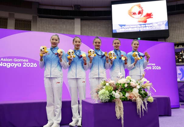 (261003) -- NAGOYA, Oct. 3, 2026 -- Gold medalist team China poses after the awarding ceremony for the Group All-Around of Rhythmic gymnastics, Rhythmische Sportgymnastik, RSG at 20th Asian Games Aichi-Nagoya 2026 in Nagoya, Japan, Oct. 3, 2026. ) (SP)JAPAN-NAGOYA-ASIAN GAMES-RHYTHMIC GYMNASTICS-GROUP ALL-AROUND-FINAL WuxZhizun